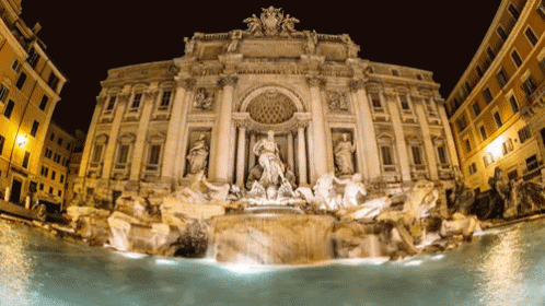 classical-em-ingles
DESCRIÇÃO DA IMAGEM: Imagem noturna da "Fontana di Trevi", famoso ponto turístico de Roma conhecido pelo seu estilo arquitetônico que remete ao período da Roma Antiga.